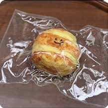 Squishy Food Stress Toy – Bread Roll with Smiling Face, Fidget Squeeze Toy, 7.5 × 7.5 × 4 cm thumbnail 1